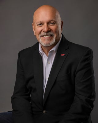 Portrait of Roger Arsenault, Broker/Owner.